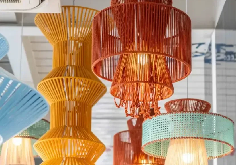 A collection of artistic, colorful glass pendant lights in bohemian and luxury styles.