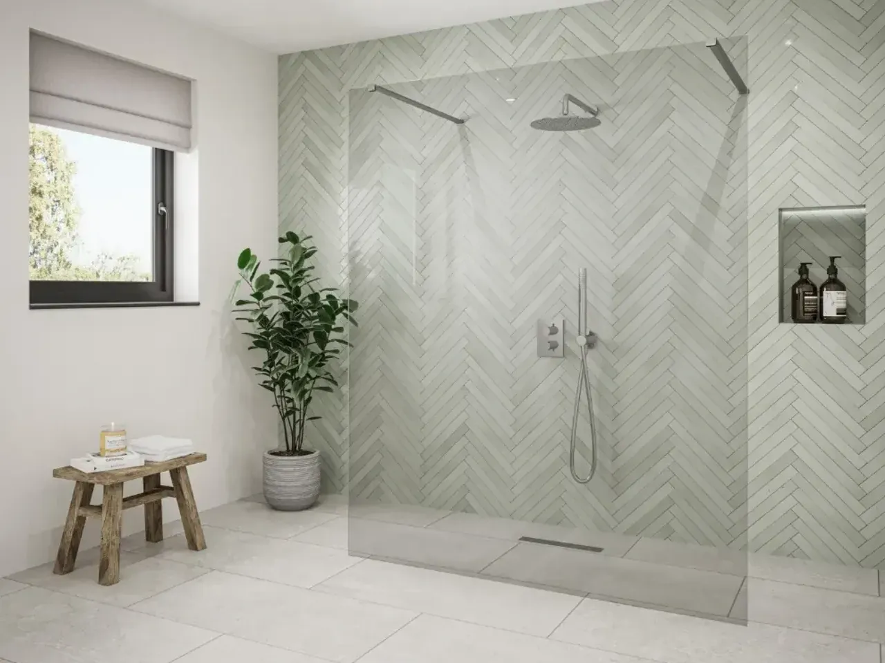 A modern bathroom in Singapore with a frameless glass shower, green herringbone tile, and a potted plant for a touch of biophilic design.