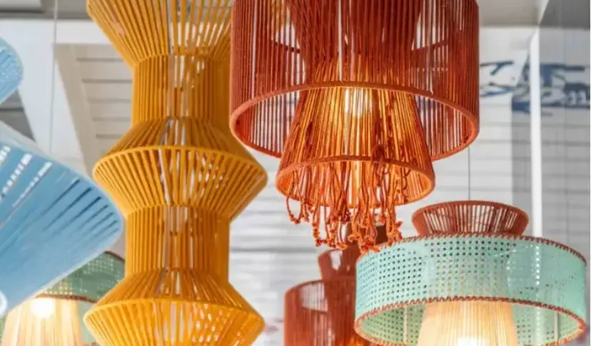 A collection of artistic, colorful glass pendant lights in bohemian and luxury styles.